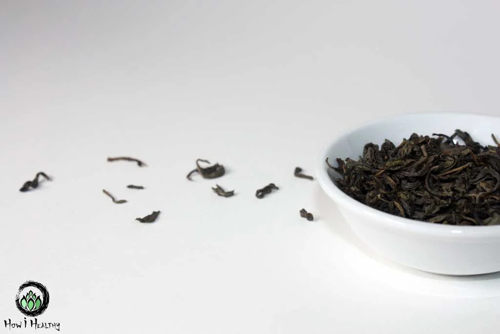 Green Tea Leaves White Dish Mountain Rose Herbs Review: The Best Sustainable Herbs, Spices, Teas, & Essential Oils Mountain Rose Herbs tea leaves in a white dish.