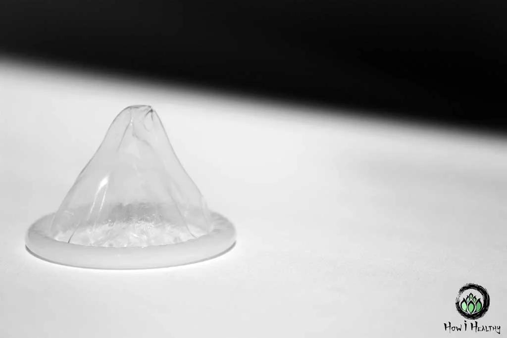 Latex Condom White Background Best Fair-Trade & Eco-Friendly Condoms Rolled eco-friendly condom.