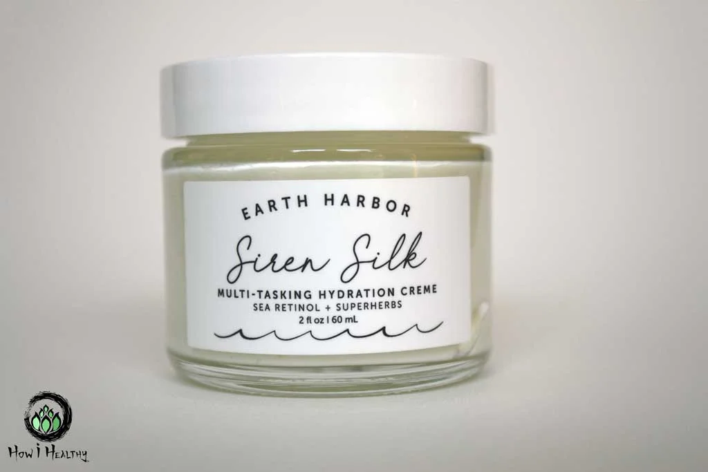Plant based Skin Serum Earth Harbor Review: The Best Evidence-Based & Natural Skincare Earth Harbor face cream in glass jar.